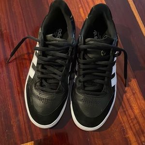Black and white men’s Adidas